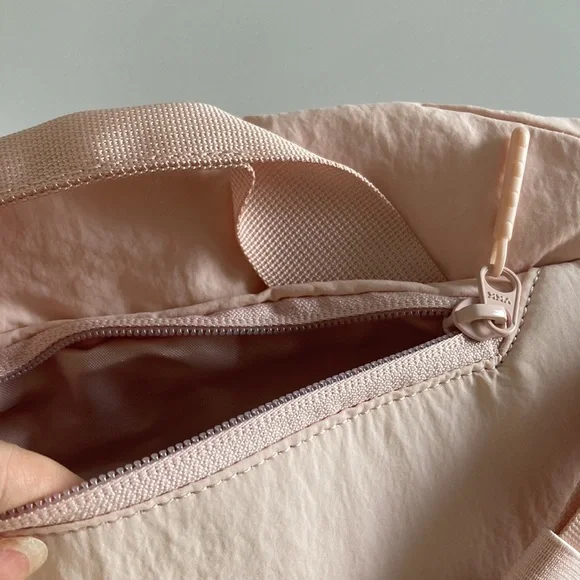 Lululemon Light Pink Curved Crossbody Bag